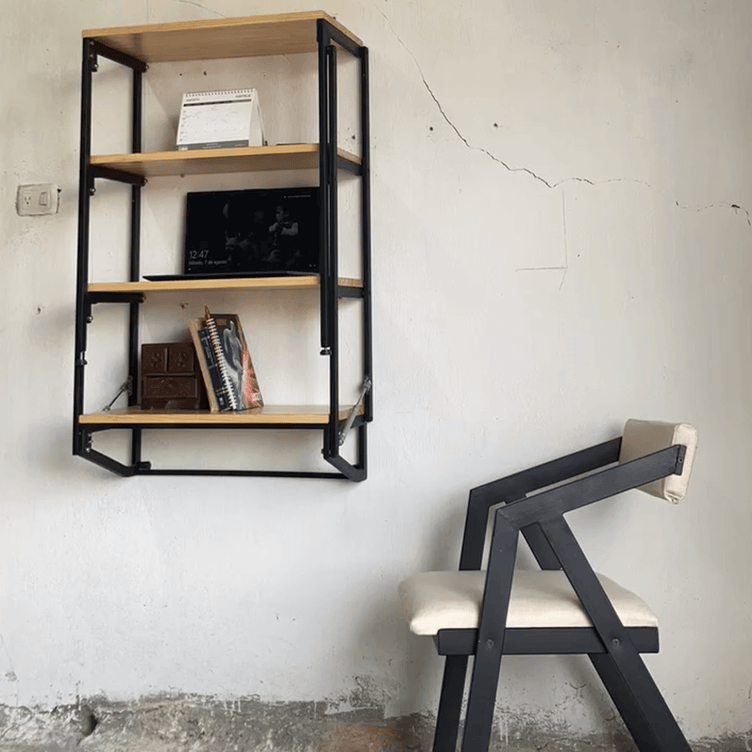 Librero plegable se convierte en escritorio, para espacios pequeños. Se sujeta a la pared. Medidas 122 cm. de largo x 77 cm. de altura x 64 cm. de ancho. 